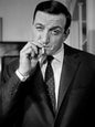 Photo Lino Ventura fumant une cigarette - Les Tontons flingueurs (1963) - 15x20