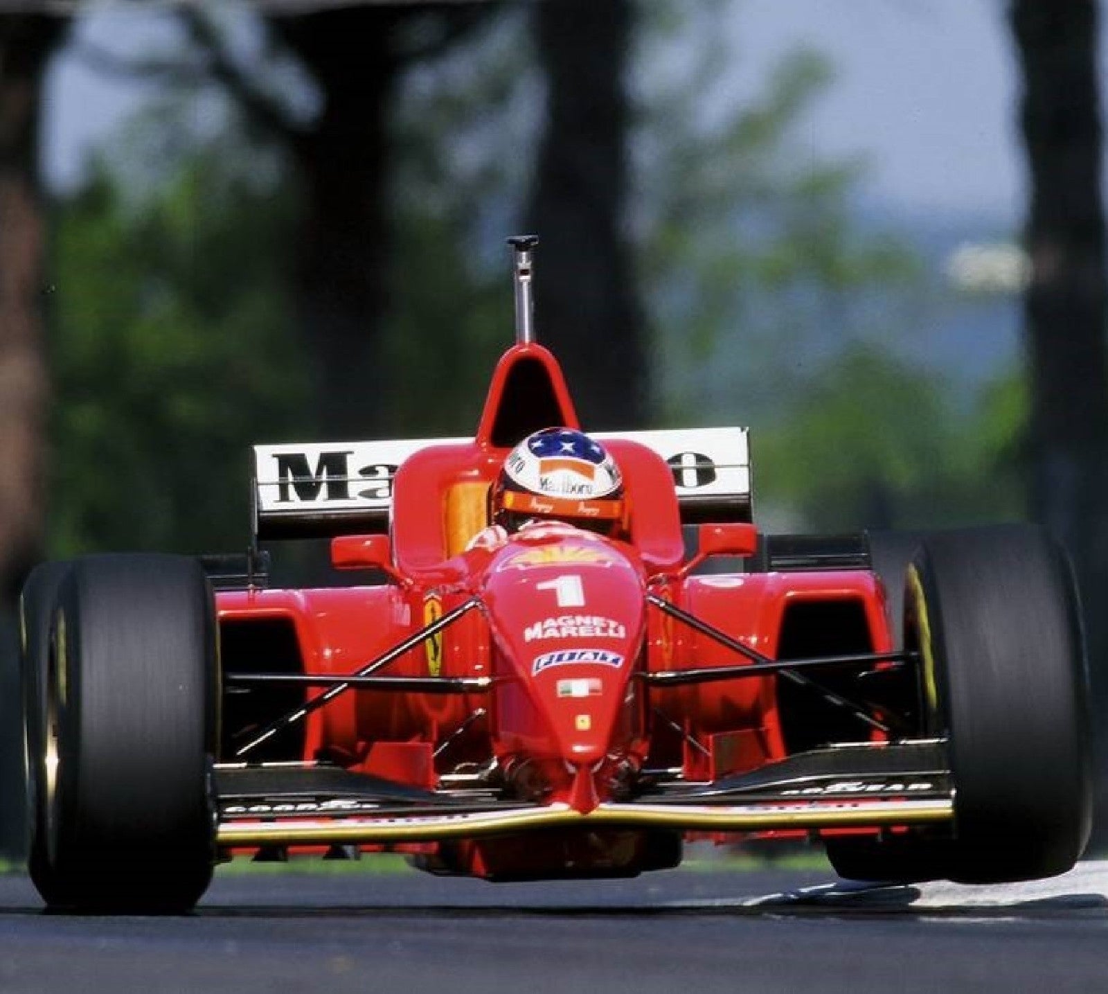 Photo Michael Schumacher – Ferrari F1 en pleine charge – Action racing – 15×20