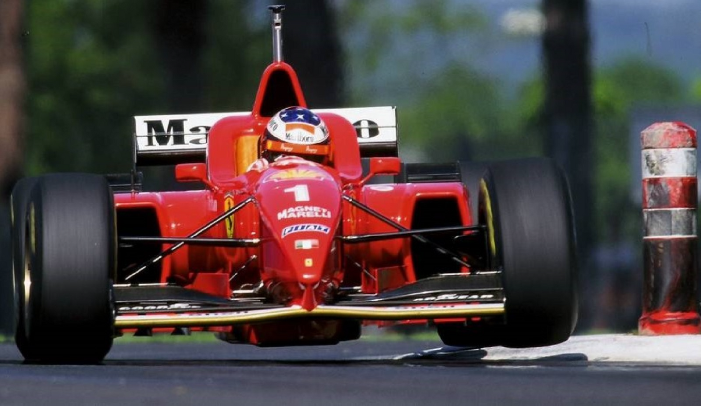 Photo Michael Schumacher – Ferrari F1 en pleine charge – Action racing – 15×20