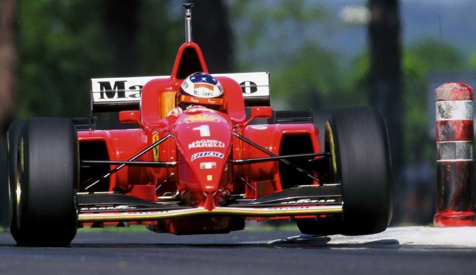 Photo Michael Schumacher – Ferrari F1 en pleine charge – Action racing – 15×20