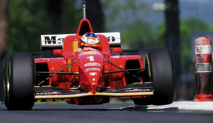 Photo Michael Schumacher – Ferrari F1 en pleine charge – Action racing – 15×20