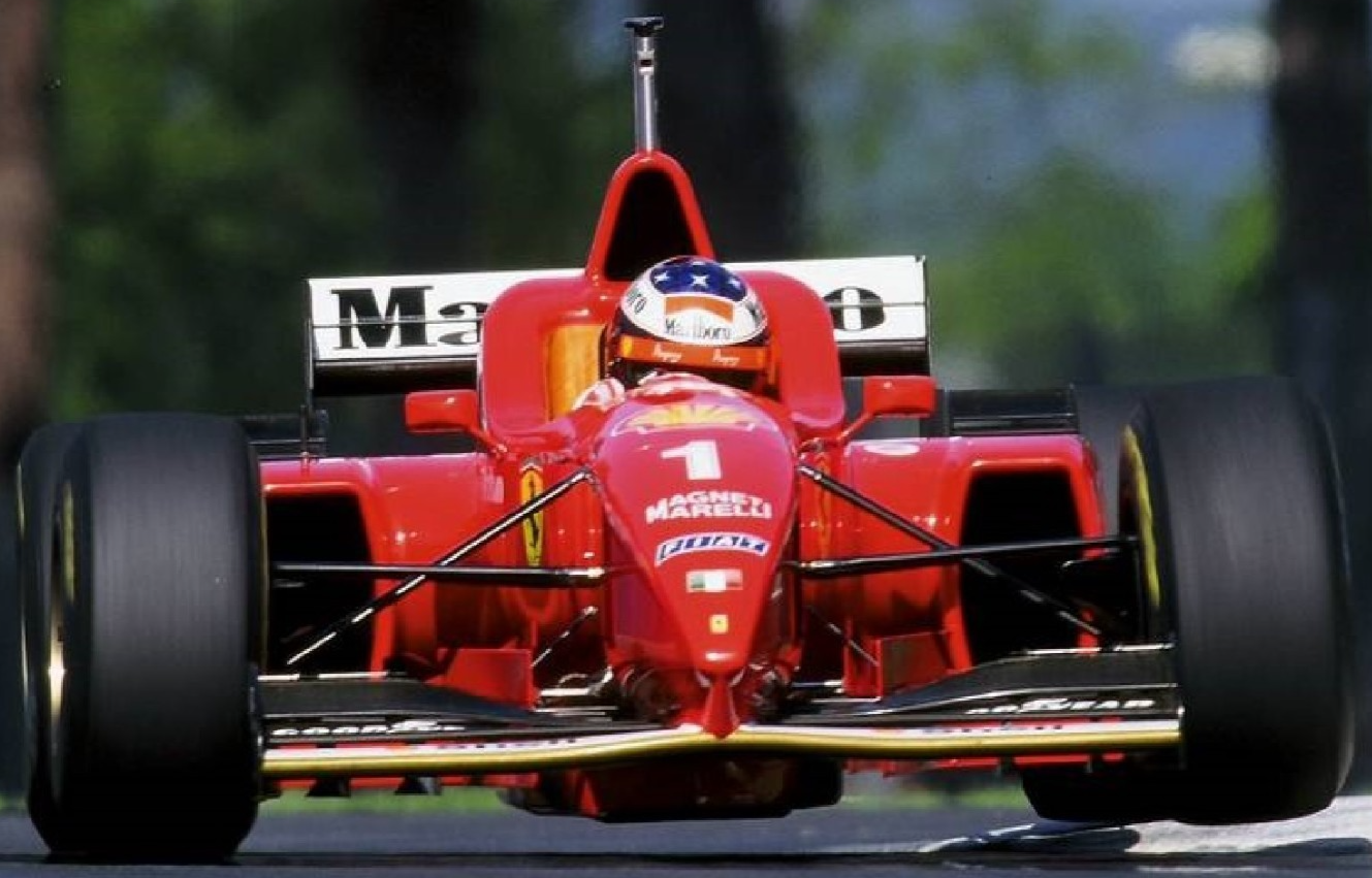 Photo Michael Schumacher – Ferrari F1 en pleine charge – Action racing – 15×20
