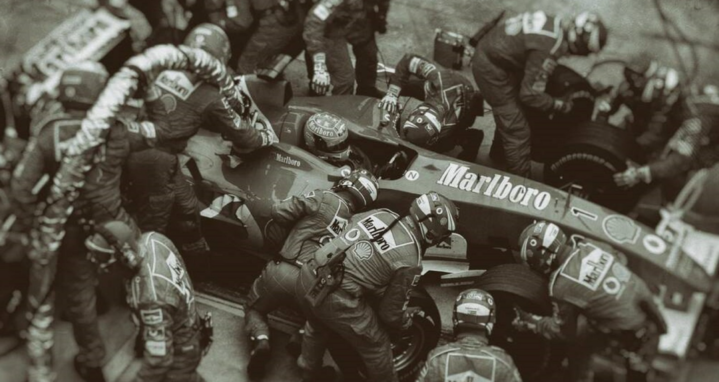 Photo Michael Schumacher – Ferrari F1 – Pit Stop Légendaire, Saison 2004 – 15×20
