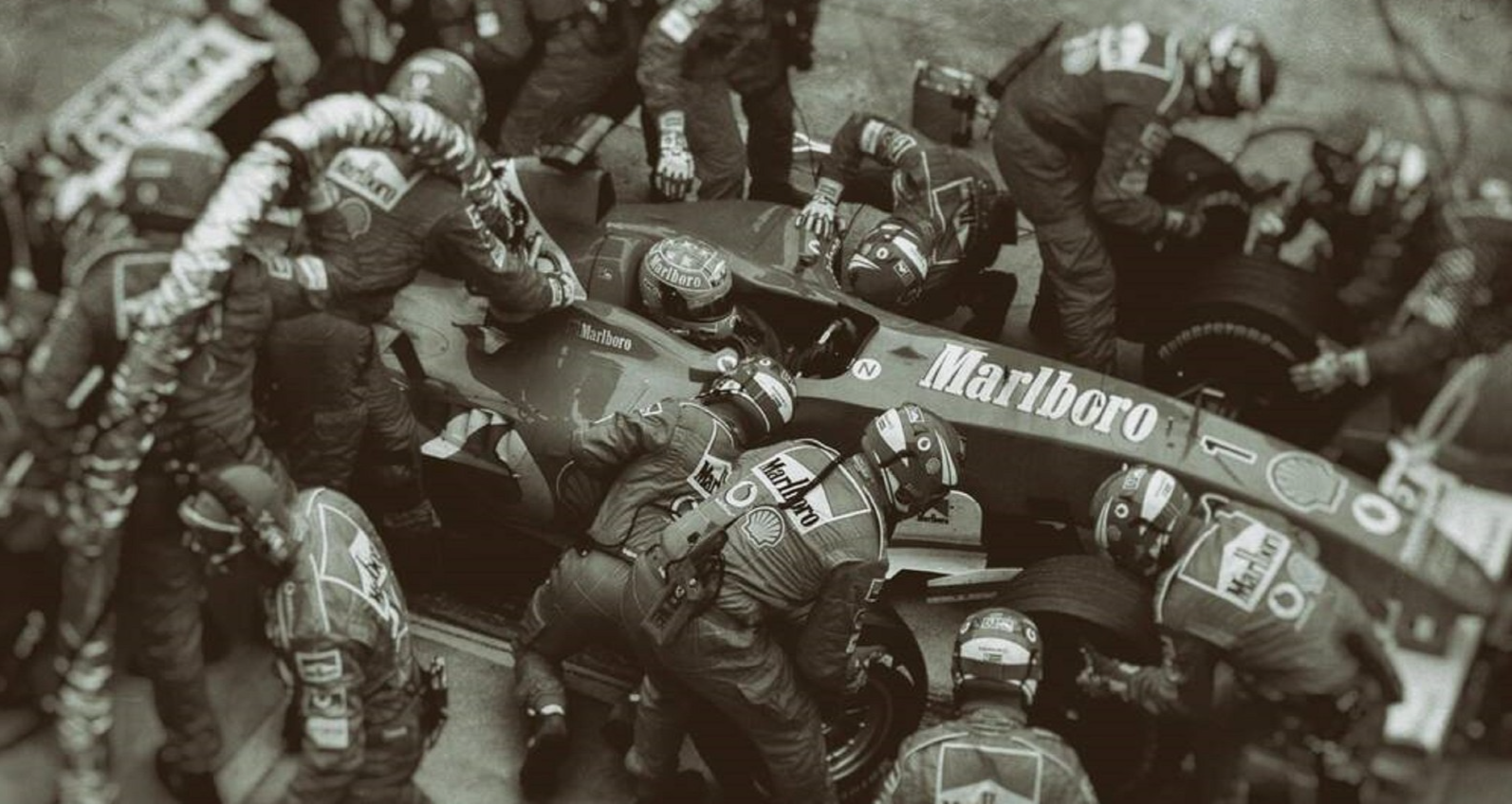 Photo Michael Schumacher – Ferrari F1 – Pit Stop Légendaire, Saison 2004 – 15×20