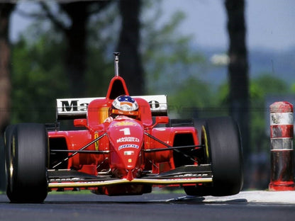 Photo Michael Schumacher – Ferrari F1 en pleine charge – Action racing – 15×20