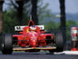 Photo Michael Schumacher – Ferrari F1 en pleine charge – Action racing – 15×20